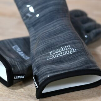 Two oven gloves showing the branding "rosehill sourdough" and "Lanon"